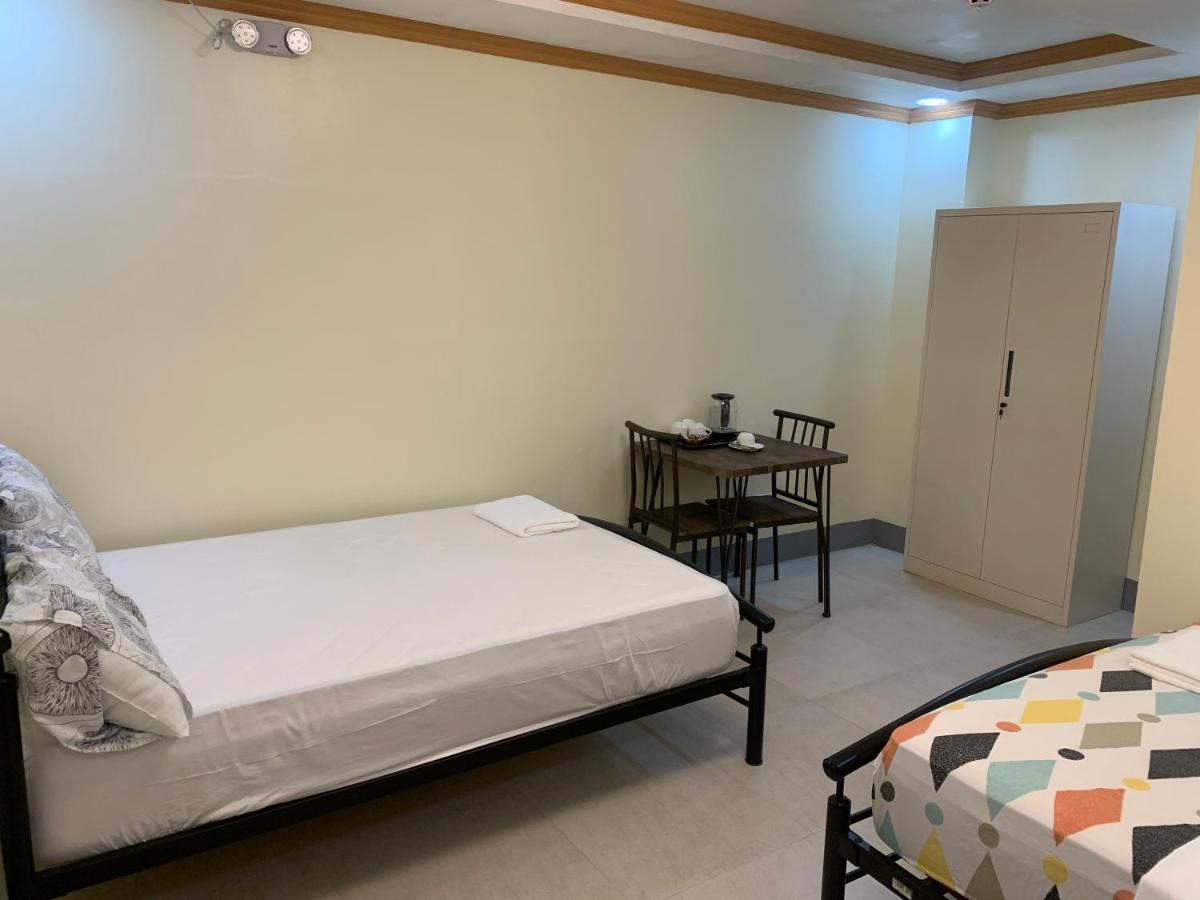 Zl Travelers Inn Batuan Bagian luar foto