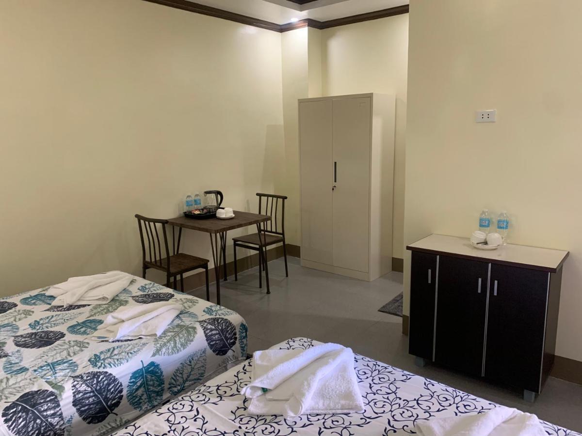 Zl Travelers Inn Batuan Bagian luar foto