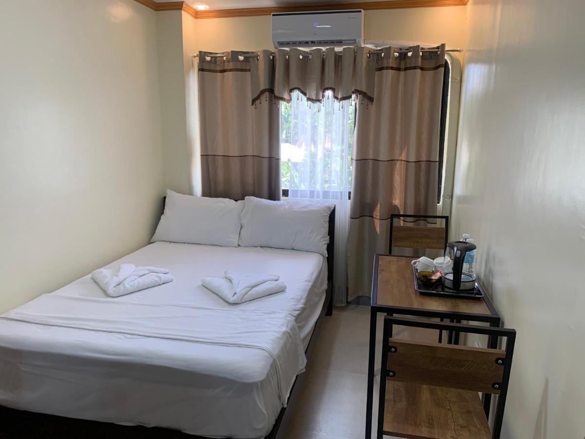 Zl Travelers Inn Batuan Bagian luar foto
