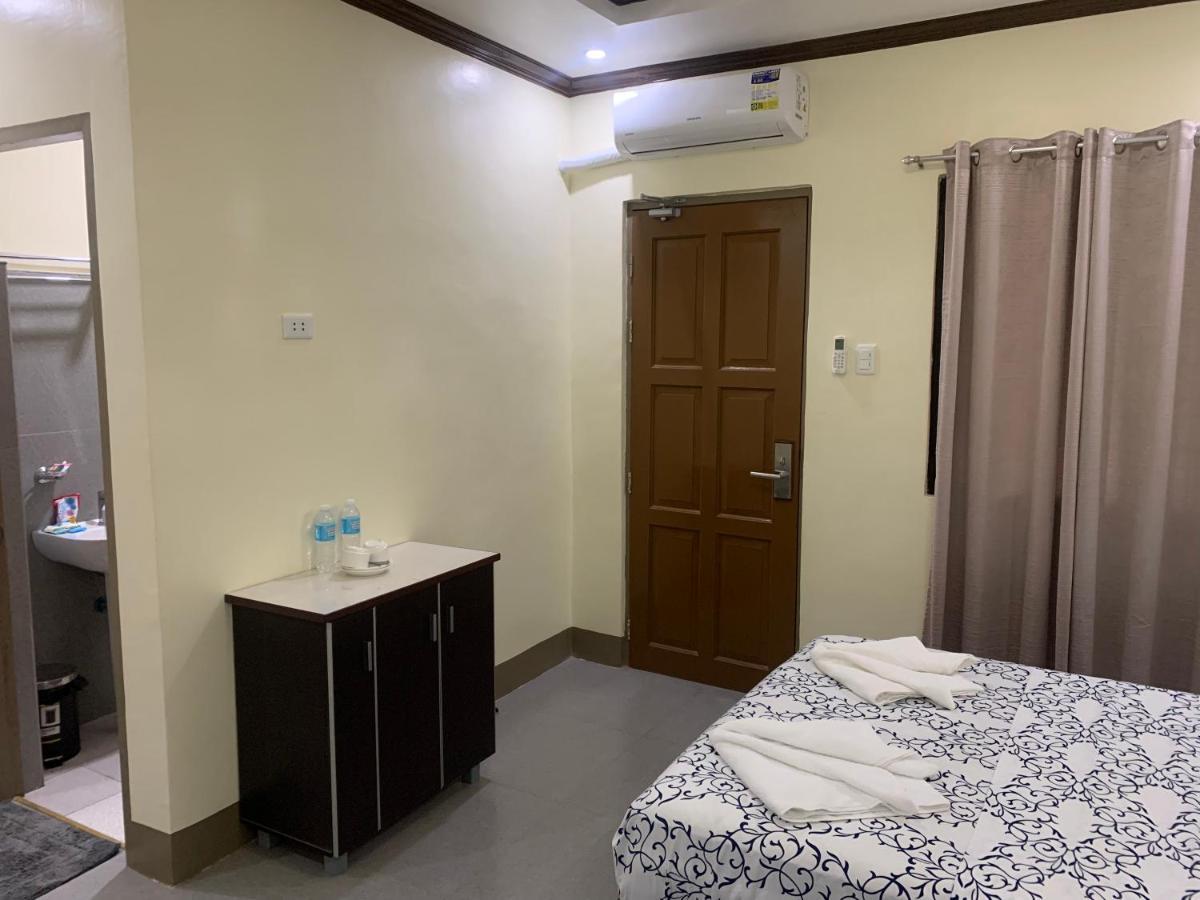 Zl Travelers Inn Batuan Bagian luar foto