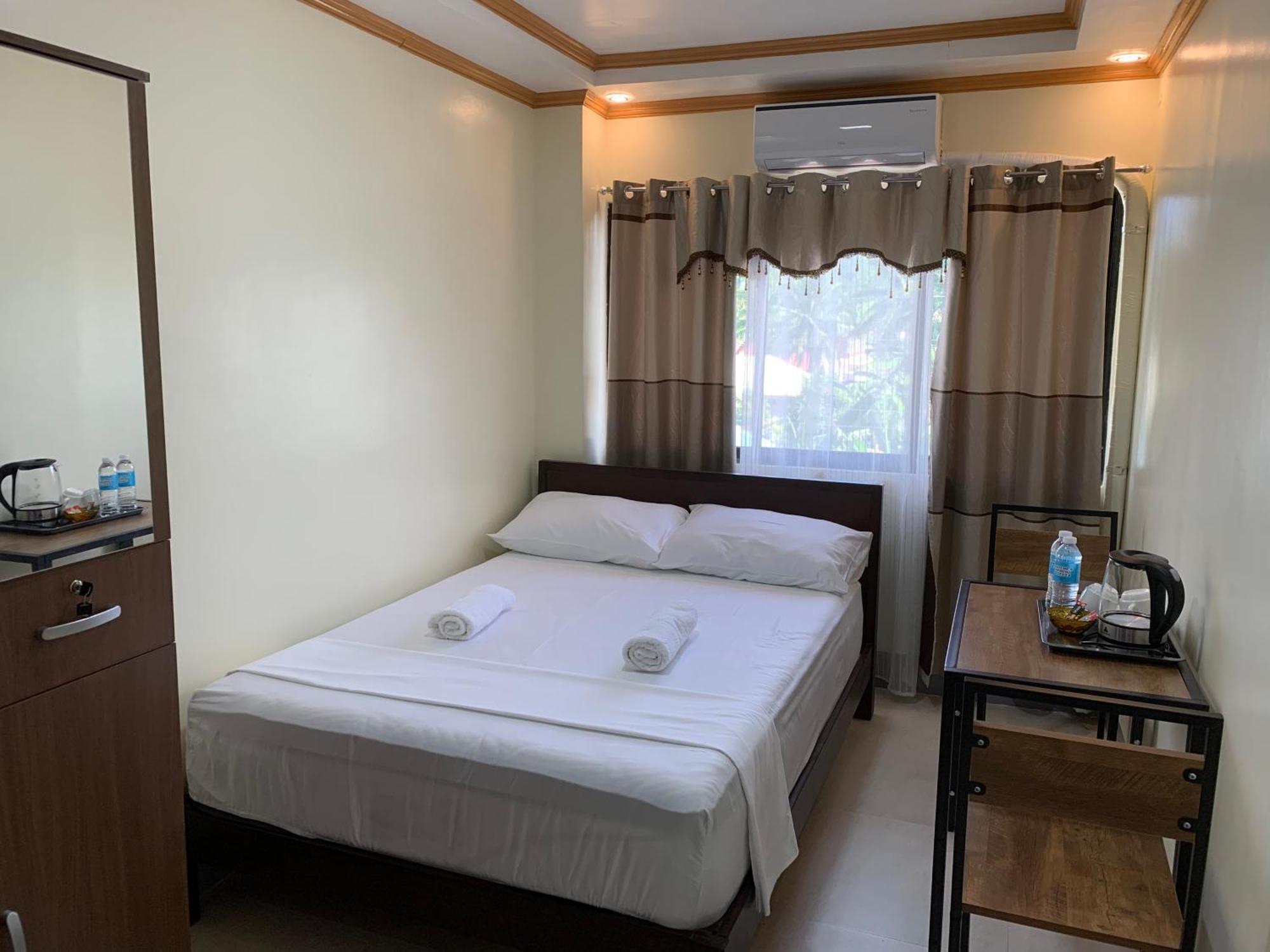 Zl Travelers Inn Batuan Bagian luar foto