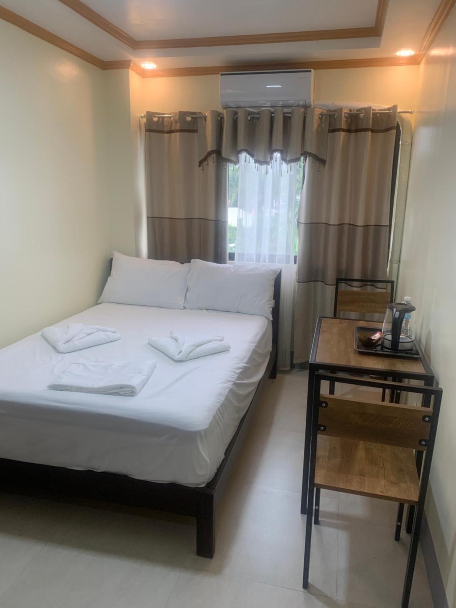 Zl Travelers Inn Batuan Bagian luar foto